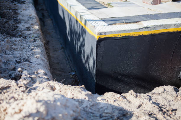 Professional Basement Waterproofing technician working in Barrington, IL